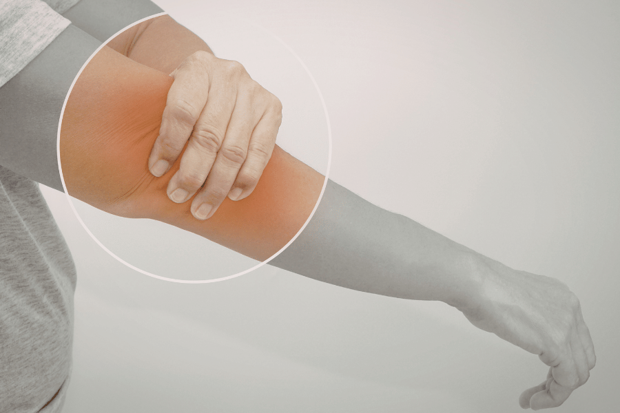 Person experiencing pain around the elbow